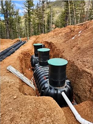 Septic tanks set in the trench on a mountain lot